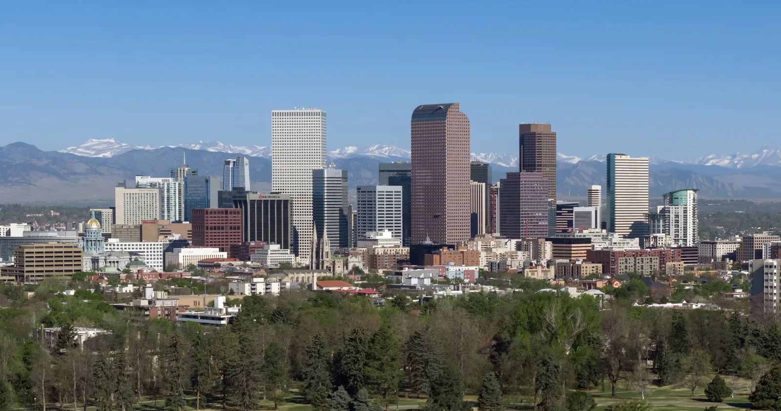 The Denver skyline beneath an open Colorado sky